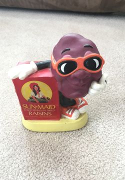 1987 Sun-maid raisin claymation figure coin bank