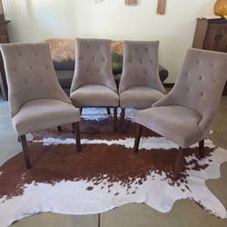 Dining chairs (4)  taupe color with extra wide comfy seats .