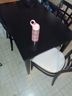Kitchen table and 3 chairs with built in plug and usb