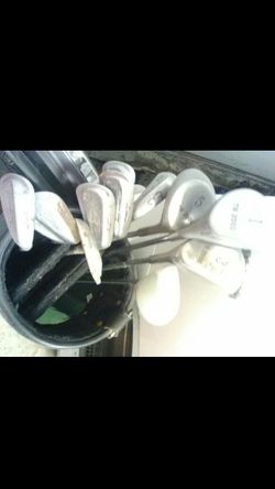 Golf clubs and carry bag