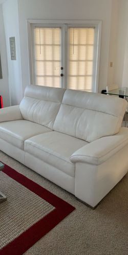 2 piece white leather sofa, must pick up