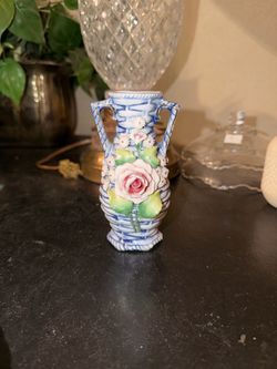 Porcelain Vase with Applied Floral Relief