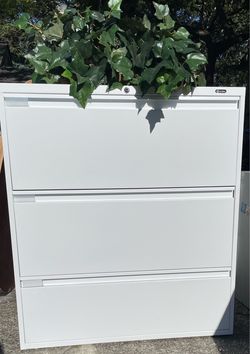 Global white lateral 3 drawer file cabinets.  Northeast Tacoma near the Centre at Norpoint