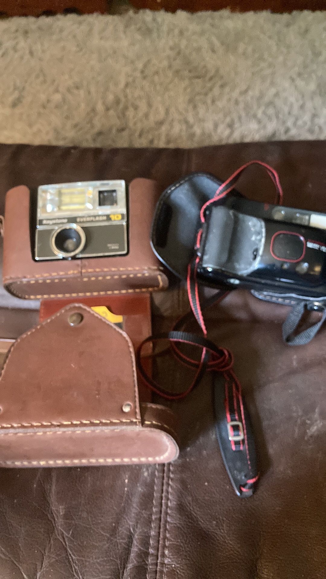 To vintage cameras with cases