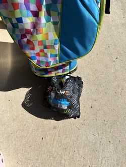 golf bag club and balls