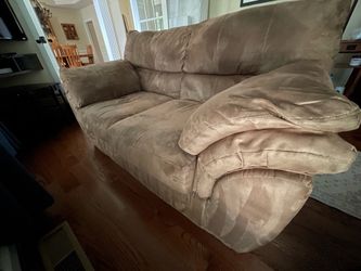 Tan microfiber love seat