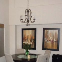 Copenhagen dining room table with Lazy Susan and 6 upholstered chairs.