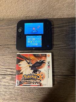 Nintendo 2DS with Pokemon and Mario Kart