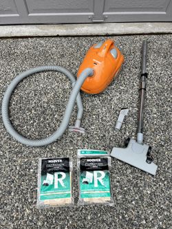 Hoover Canister Vacuum Cleaner + bags