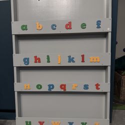 Space saving wall bookcase with alphabet 77D x 7W x 115H centimetres