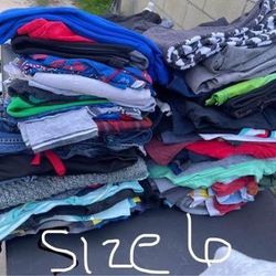 size 6and 7 boys clothes . ALot available pants Tshirts pjs sweaters 2$-5$ a piece come look . Please don’t waste my time . Lot price available if you