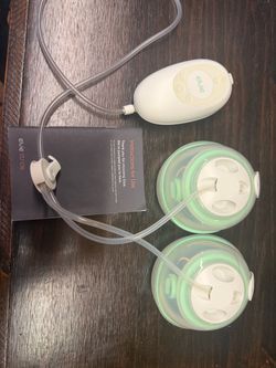 Hands-free breast pump with insulated traveling pump backpack Hands-free breast pump with insulated traveling pump backpack