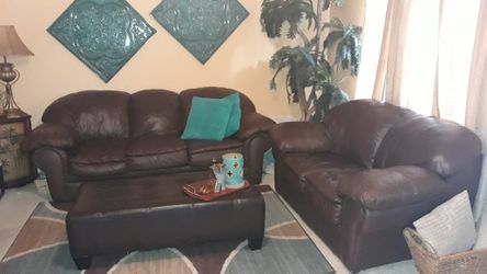 Super comfortable brown sofa, loveseat, ottoman, & rug. $600