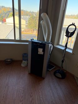 Portable air-conditioning and heater brand new and everything else worth it