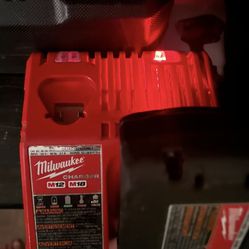 2 Used Milwaukee 12 And 18 Volt Chargers Good Condition Battery Is Only In Picture To Show Charge Works 35 Each No Battery 
