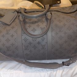 Louie Vuitton Duffle Bag