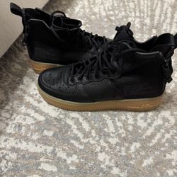 Black Air Force 1s High Tops with Bubble Gum Bottoms 