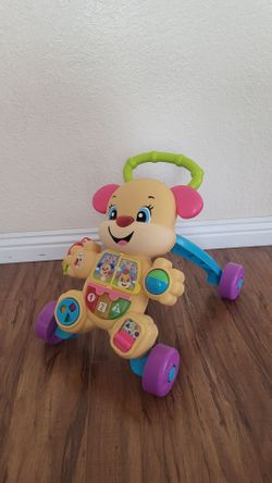 Practically New Baby Walker With Music And Lights ( Used Once).