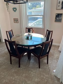 Mid century dining table 48” diameter  + Chairs
