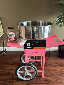 Cotto candy machine including suger and sticks