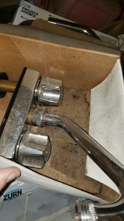 2 handle 4 inch center spread faucet for laundry sink or other applications