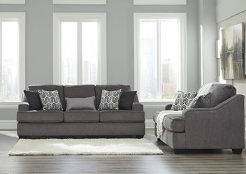 Living room couch and love seat with pillows!