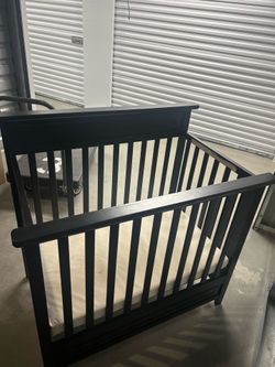 Black crib + mattress