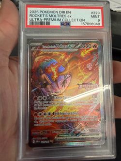 Team Rocket’s Moltres ex #229/182 (Special Illustration Rare) from Destined Rivals, graded PSA 9 Mint.