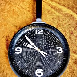 Decorative “kitchen pan” wall clock;