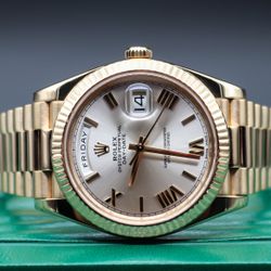 Rolex Day-Date. Gold. President. Silver Roman. 228238