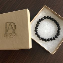 DeMarcus Alexan 8mm Black Golden Stripe Bead Bracelet 