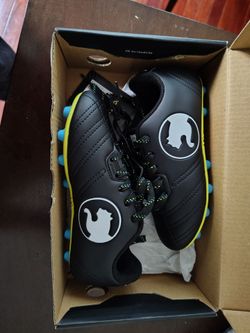 Black Soccer Cleats with Yellow Trim