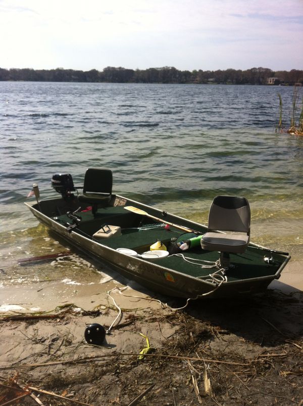 12 Ft. Grumman Jon boat w/motor &amp; trailer for Sale in 