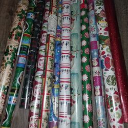 12 Rolls Of Wrapping Paper Still In Packaging 