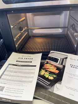 Sur La Table 13-Quart Multifunctional Air Fryer (Model SLT-1818), which includes a rotisserie function and a digital LED touchscreen