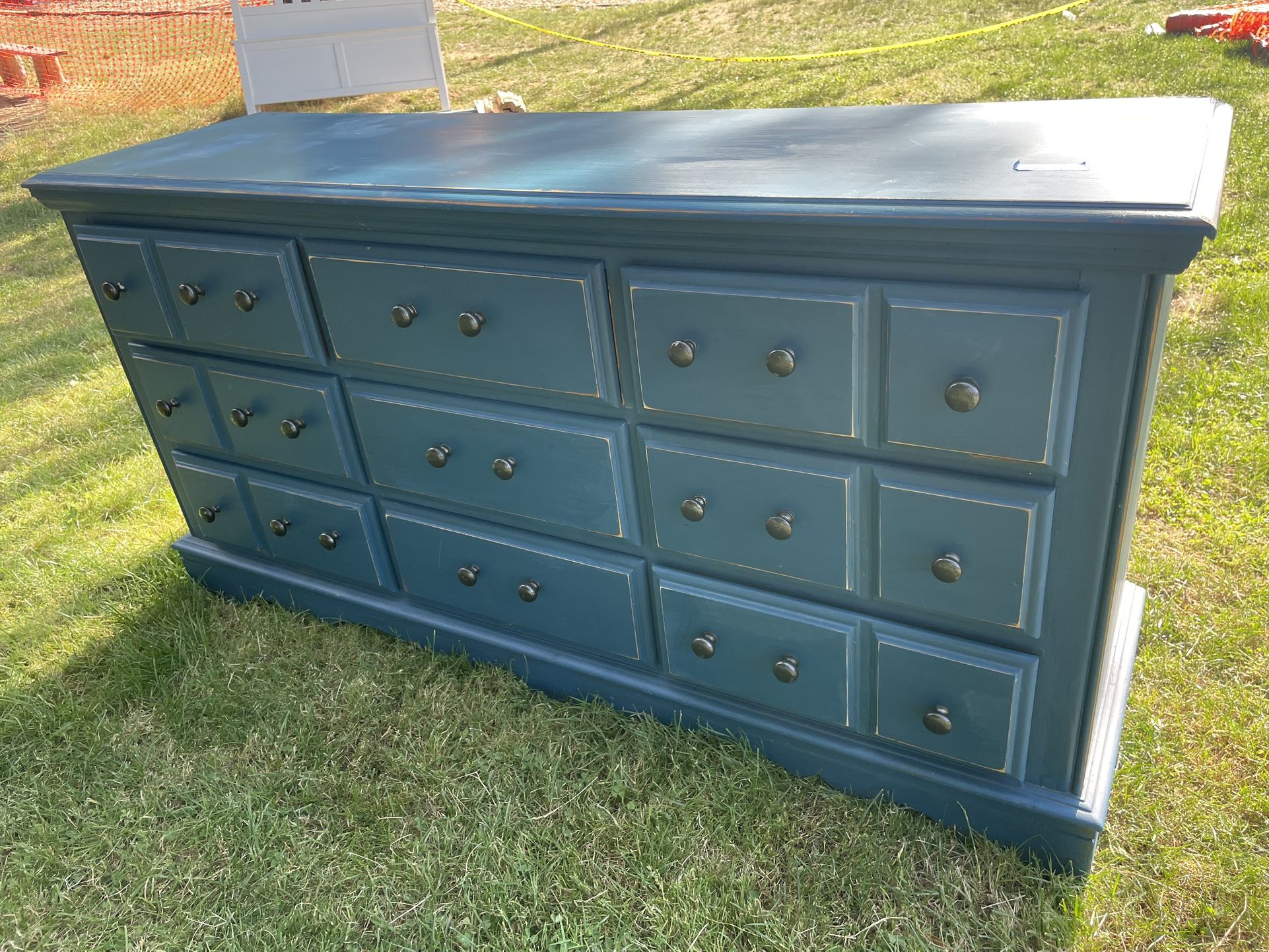 Distressed blue wood dresser