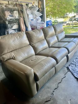 Leather Sofa And Matching Swivel Chair 