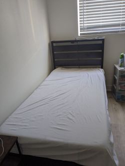 Twin bed frame with mattress and led lights