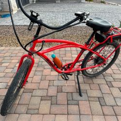 Men’s bright orange electric bike 40 amp battery,60 mile range.