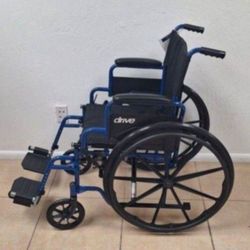 Wheelchair with Swing-Away Footrests and Flip-Back. Arms