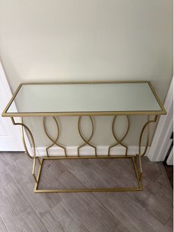 Gold metal console table