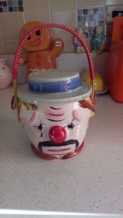 Vintage clown face cookie jar