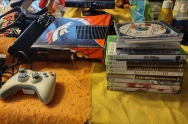 Xbox 360 denver broncos edition with 15 games tested and works amazing will not separate