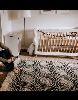 Wooden crib (including mattress)