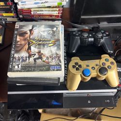 PlayStation 3 bundle with 5 games 2 controllers