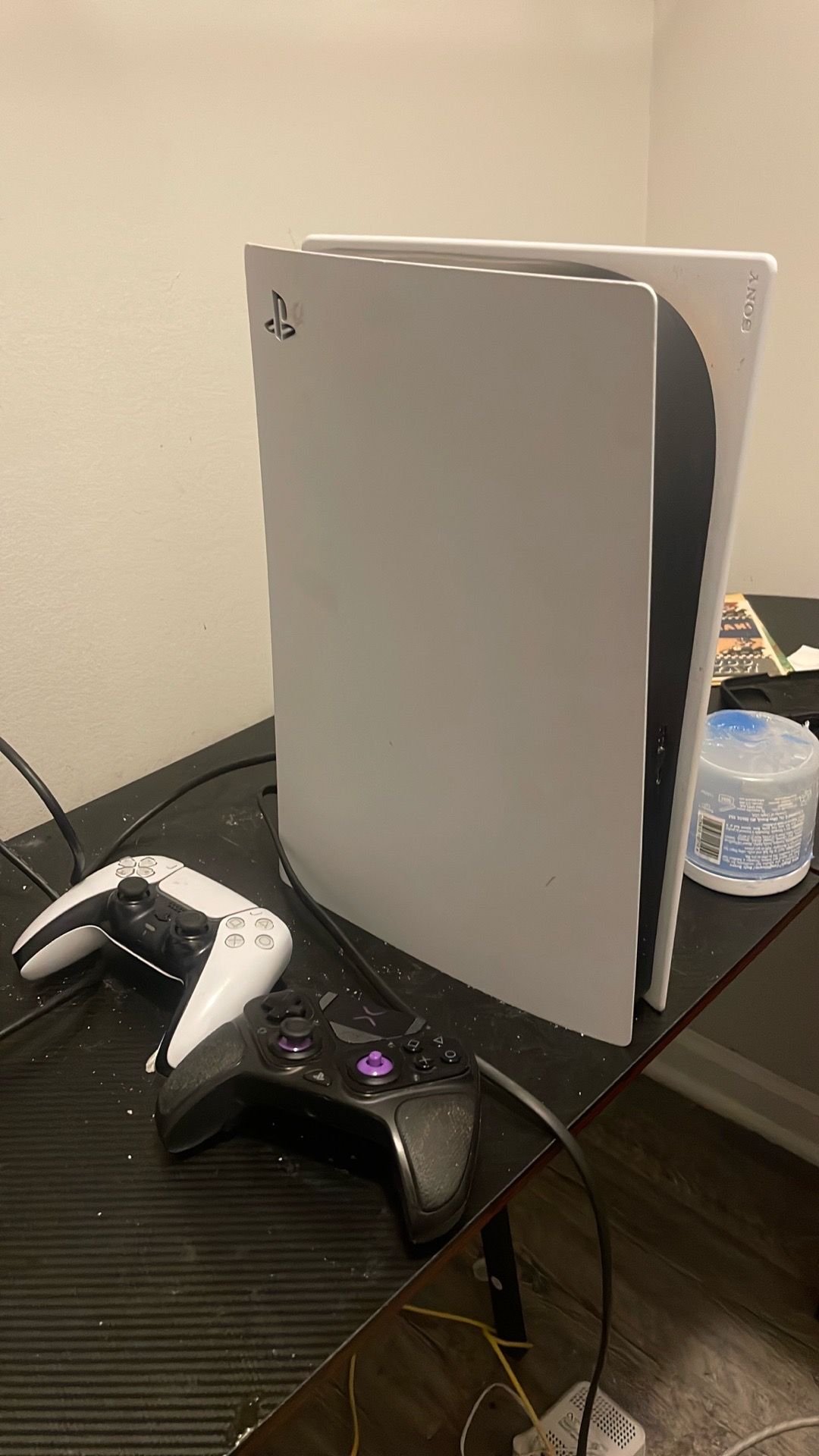 Ps5 with one controller and a scuff controller
