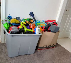 2 Boxes Of Random Toys. Price Will Be $20 Each Box