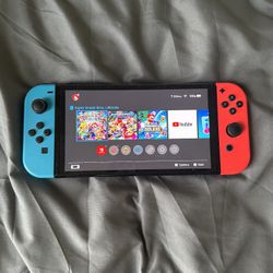 Nintendo Switch OLED With Smash Bros