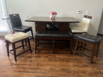 dining table set with chairs and bench