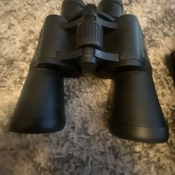 Sharper image Binoculars With Bag